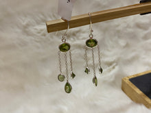 Load image into Gallery viewer, Peridot dangle earrings in silver.
