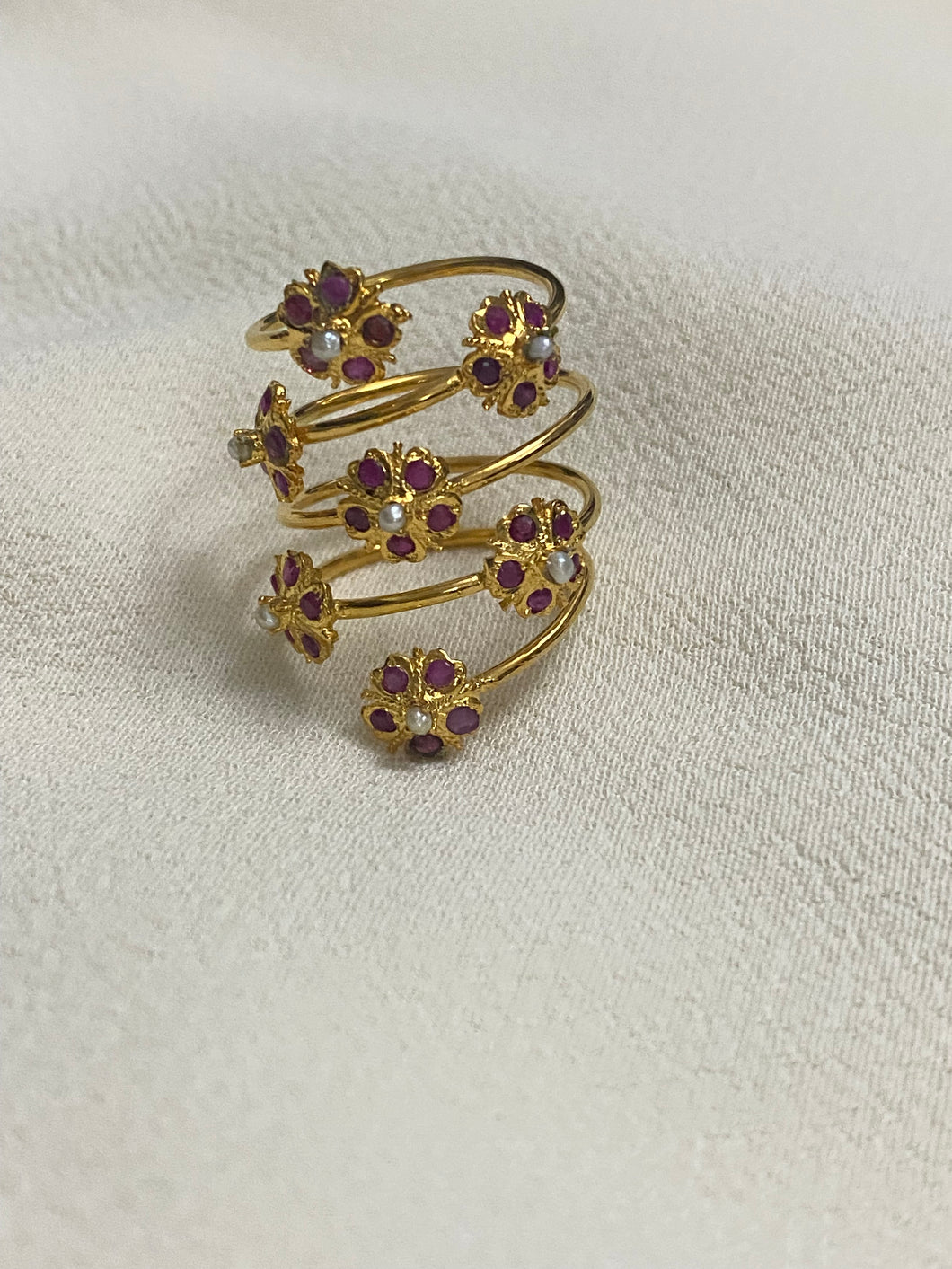 Ruby pearl spiral ring.